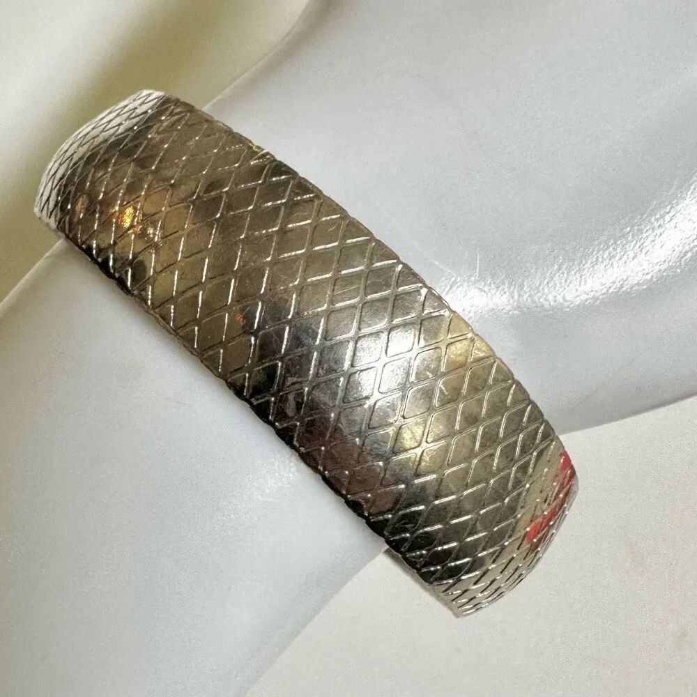 Silver tone bangle bracelet